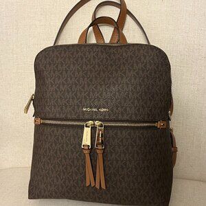 Michael Kors Signature Rhea Zip Medium Slim Backpack in Brown